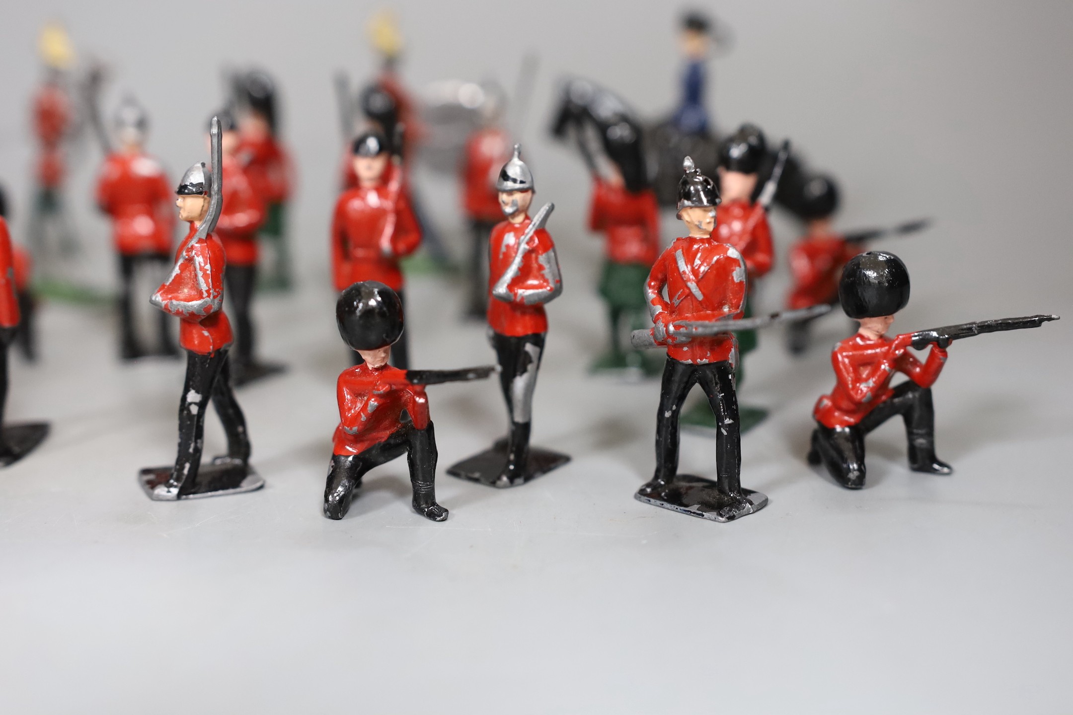 A quantity of cold painted lead soldiers and band.